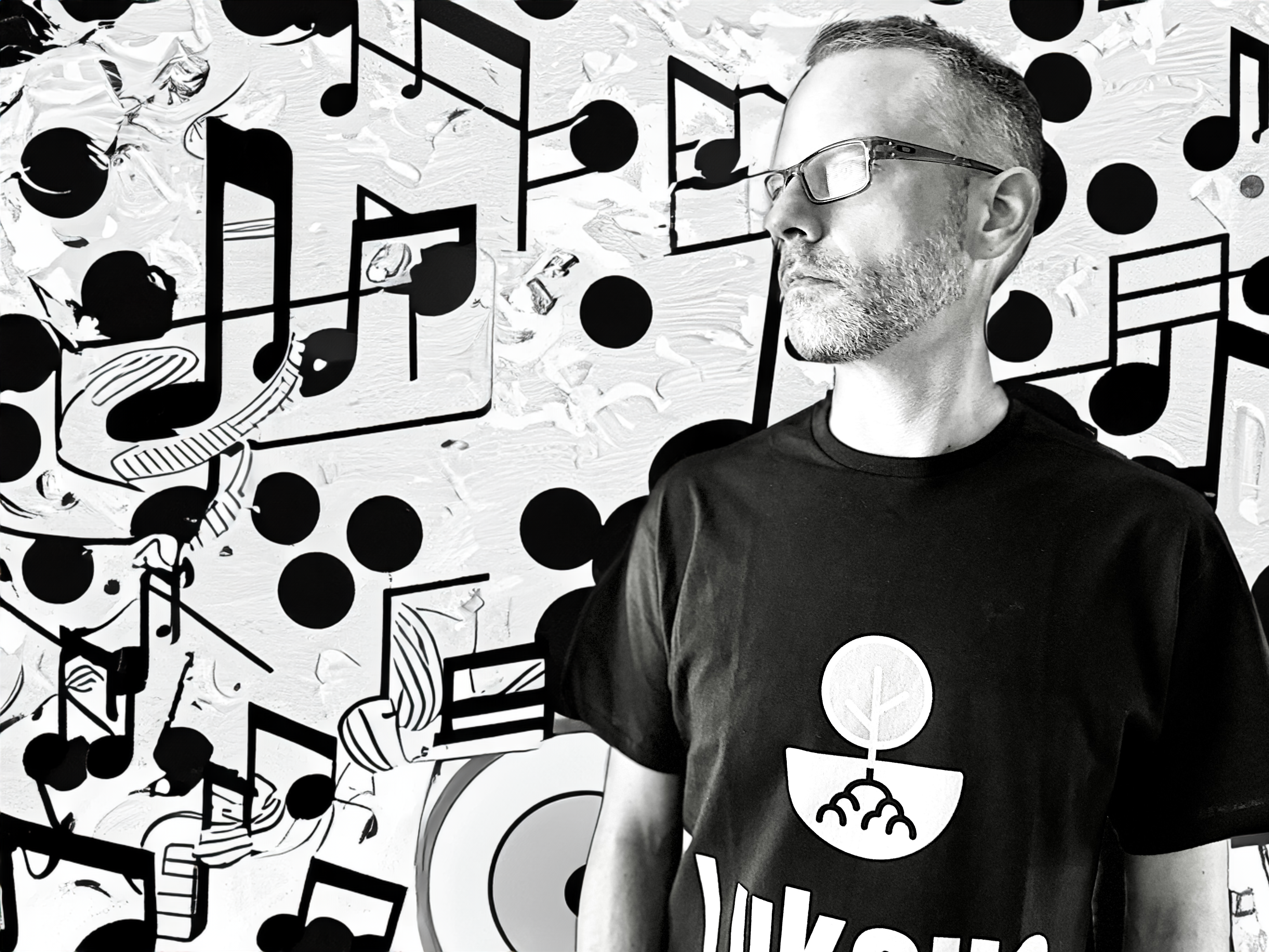 Lukeus - Music Producer and Songwriter surrounded by musical notes